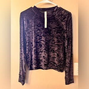 Lululemon size 4 long sleeve black crushed velvet top.